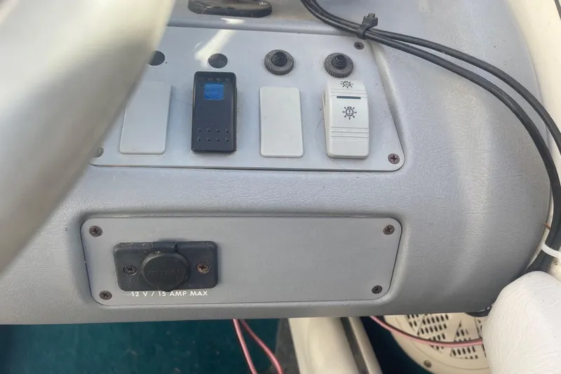 Slide: The Image of Control panel of a 1996 Sea Ray 210 Bow Rider boat. - 18