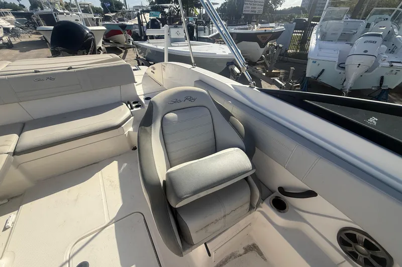 Slide: The Image of 2020 Sea Ray SPX 210 Outboard boat interior with seating and speaker. - 15