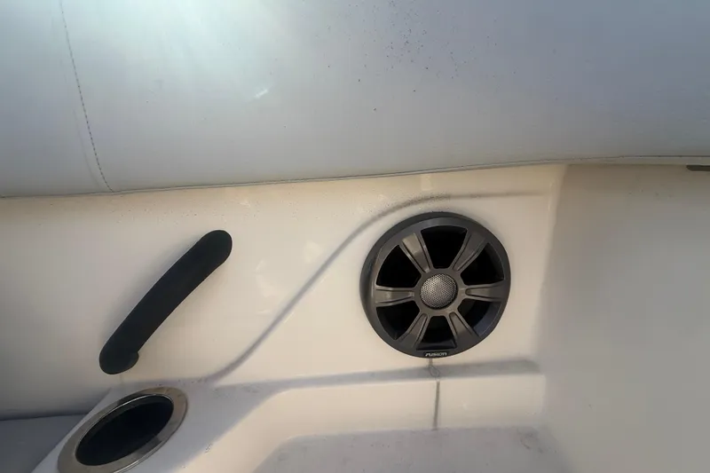 Slide: The Image of Boat interior with speaker and handle, Sea Ray SPX 210 Outboard, 2020 model. - 17