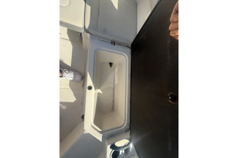 Slide: The Image of 2020 Sea Ray SPX 210 Outboard boat interior storage compartment. - 19
