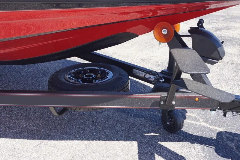 Slide: The Image of Red Skeeter ZXE21 boat trailer with spare tire, 2026 model. - 4