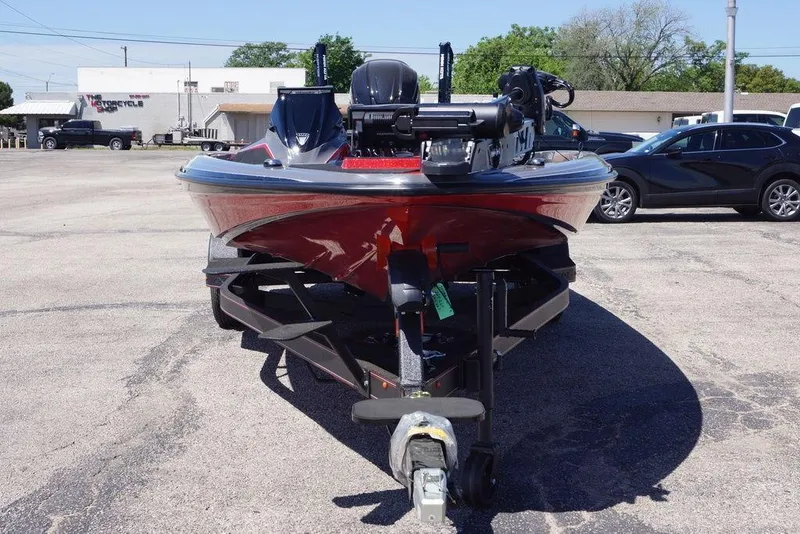 Slide: The Image of 2026 Skeeter ZXE21 boat on trailer in parking lot, front view. - 7