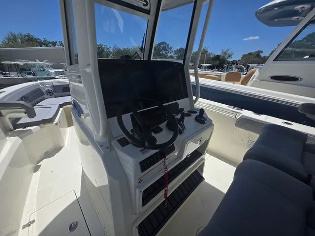 Slide: The Image of Cobia 285 Open Center Console 2026 - 11