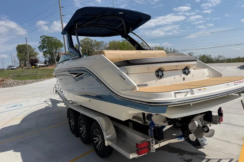 Slide: The Image of 2021 Sea Ray SLX 280 boat on trailer, sunny day, rear view. - 5