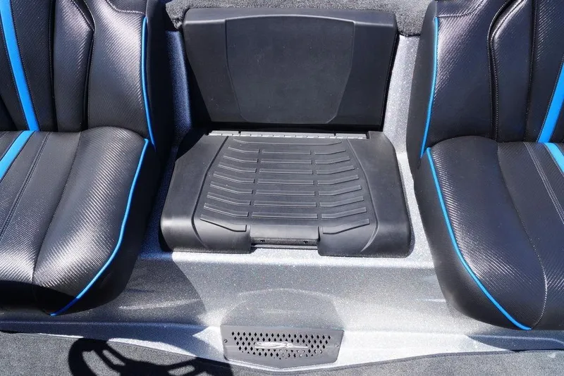Slide: The Image of 2026 Skeeter ZXE21 boat interior with black and blue seating. - 11