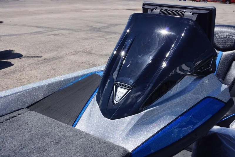 Slide: The Image of 2026 Skeeter ZXE21 boat console with sleek design and glossy finish. - 13