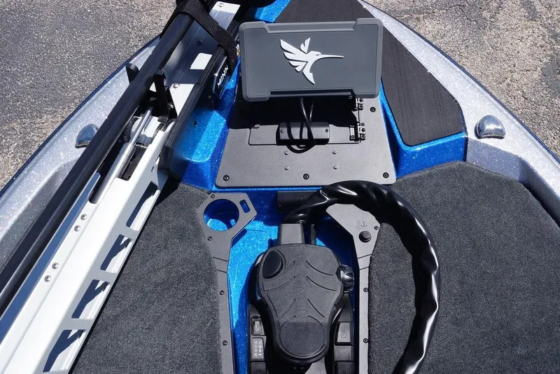 Slide: The Image of 2026 Skeeter ZXE21 boat deck with control panel and foot pedal. - 16