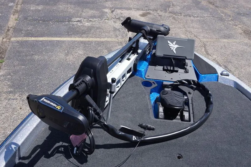 Slide: The Image of 2026 Skeeter ZXE21 boat with advanced trolling motor and navigation system on deck. - 17