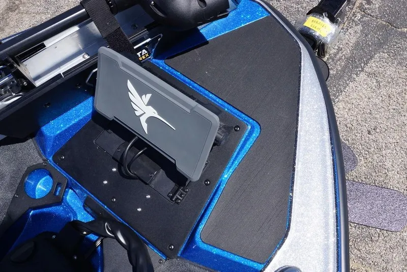 Slide: The Image of 2026 Skeeter ZXE21 boat dashboard with electronic display and sleek design. - 21