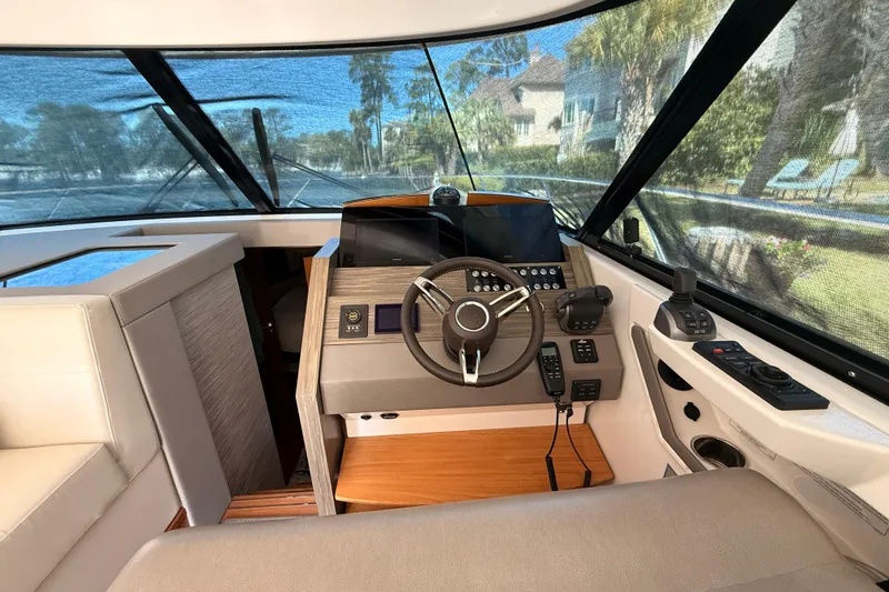 Slide: The Image of Luxurious interior of 2020 Tiara Yachts C44 Coupe with modern kitchen and cozy seating area. - 14
