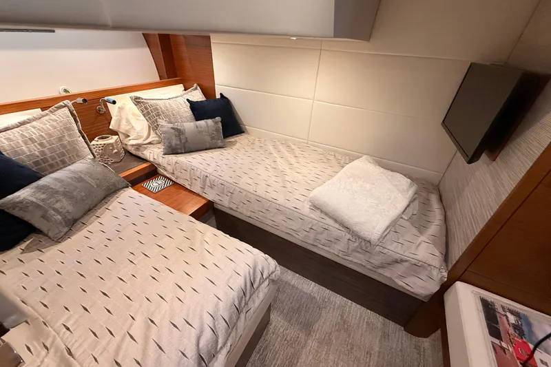 Slide: The Image of Luxurious bathroom in 2020 Tiara Yachts C44 Coupe with modern sink and shower. - 21