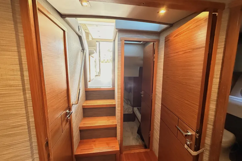 Slide: The Image of Luxurious bathroom in 2020 Tiara Yachts C44 Coupe with modern fixtures and elegant design. - 31