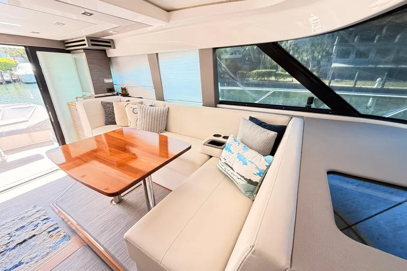 Slide: The Image of Interior view of 2020 Tiara Yachts C44 Coupe, showcasing luxurious seating and modern design. - 35