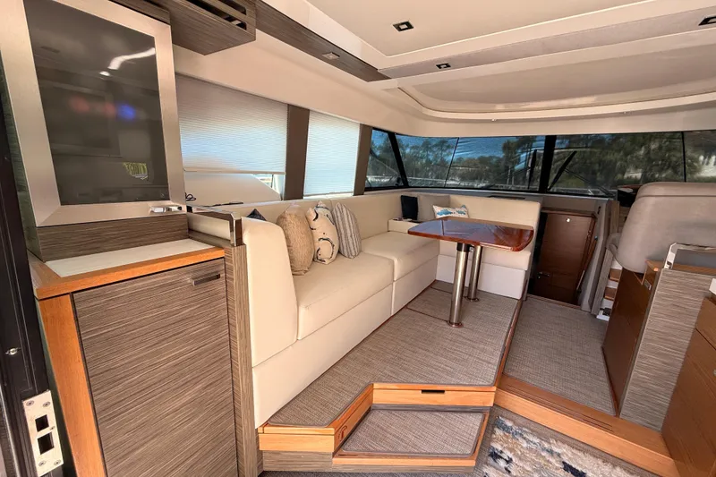 Slide: The Image of Interior of 2020 Tiara Yachts C44 Coupe, featuring helm and seating area. - 36