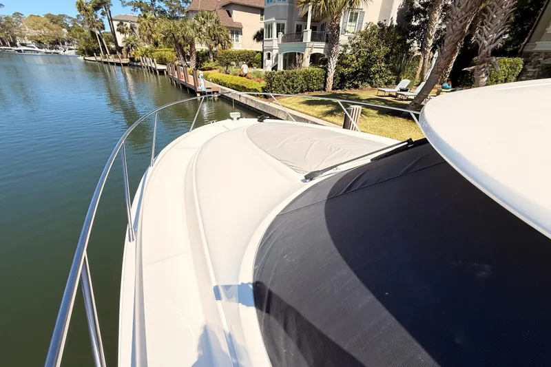 Slide: The Image of Luxurious interior of 2020 Tiara Yachts C44 Coupe with elegant seating and wooden accents. - 38