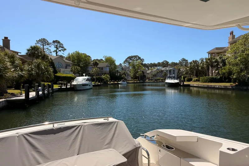 Slide: The Image of Luxurious seating area on 2020 Tiara Yachts C44 Coupe, featuring elegant design and comfort. - 56