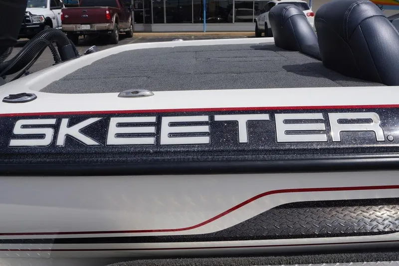 Slide: The Image of 2013 Skeeter ZX190 boat with logo and seating area. - 10