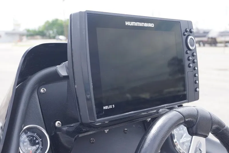 Slide: The Image of Humminbird Helix 9 fishfinder on 2013 Skeeter ZX190 boat dashboard. - 11