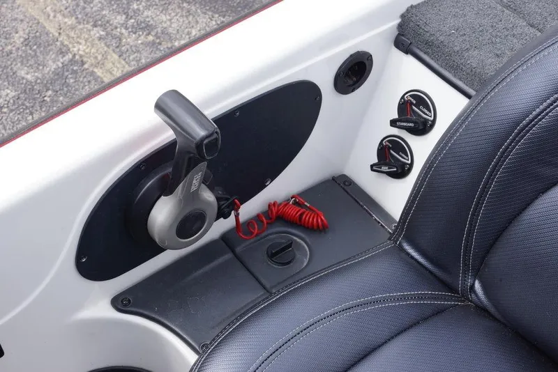 Slide: The Image of 2013 Skeeter ZX190 boat interior with control panel and seating. - 14