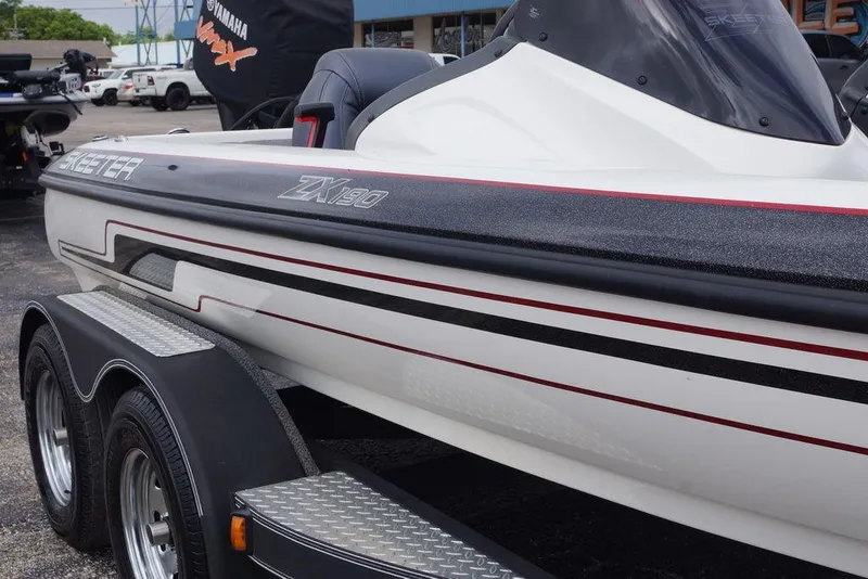Slide: The Image of 2013 Skeeter ZX190 boat on trailer, featuring sleek design and Yamaha VMAX branding. - 20