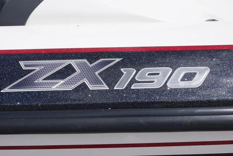 Slide: The Image of 2013 Skeeter ZX190 logo on a glittery black and red background. - 9