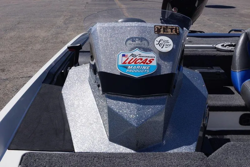 Slide: The Image of 2019 Ranger Z185 boat dashboard with stickers, including Lucas Marine Products. - 20