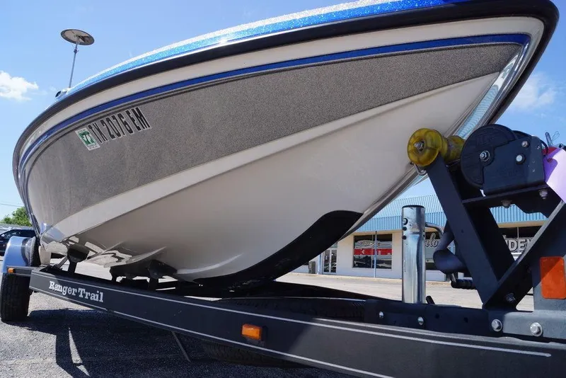 Slide: The Image of 2019 Ranger Z185 boat on trailer, close-up view, sunny day. - 4