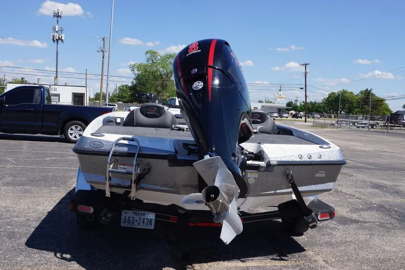 Slide: The Image of 2019 Ranger Z185 boat with outboard motor in parking lot, rear view. - 6