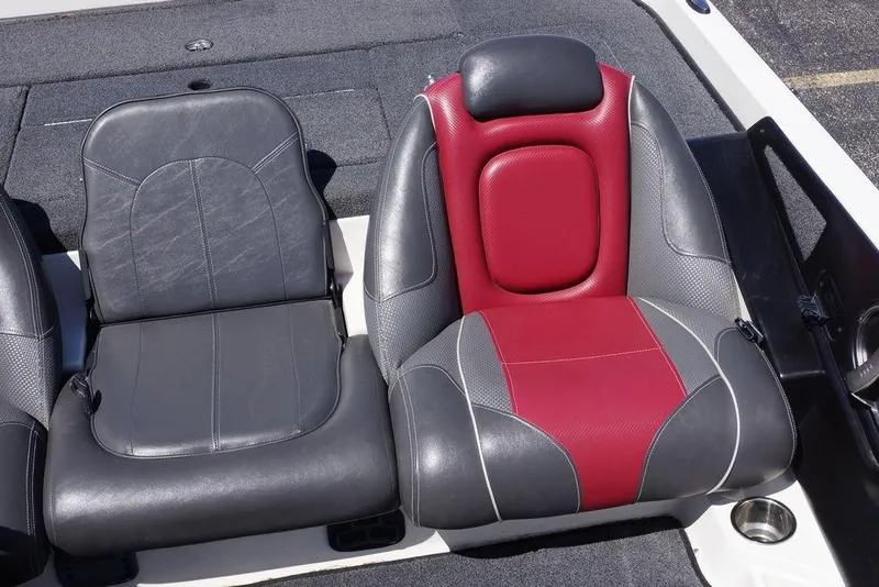 Slide: The Image of 2018 Ranger Z519 boat seats, featuring gray and red upholstery. - 11