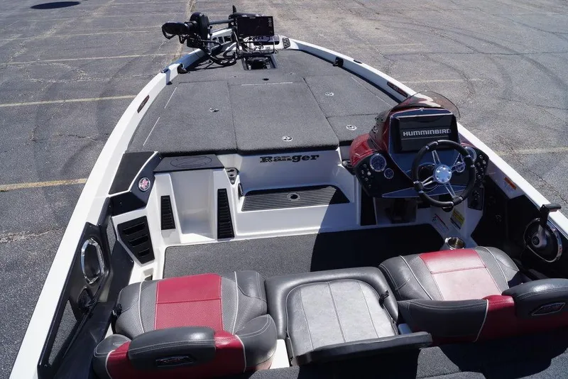 Slide: The Image of 2018 Ranger Z519 boat interior with steering wheel and seating, featuring Humminbird electronics. - 12