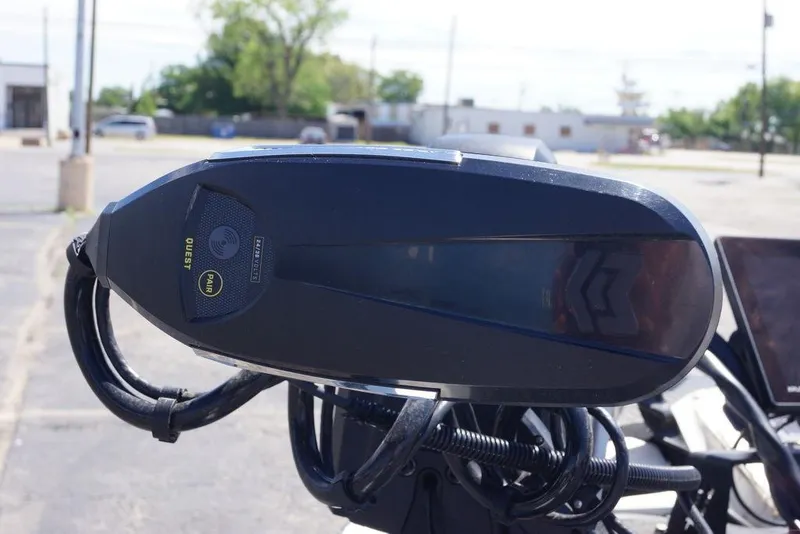 Slide: The Image of 2018 Ranger Z519 boat motor close-up in a parking lot setting. - 16