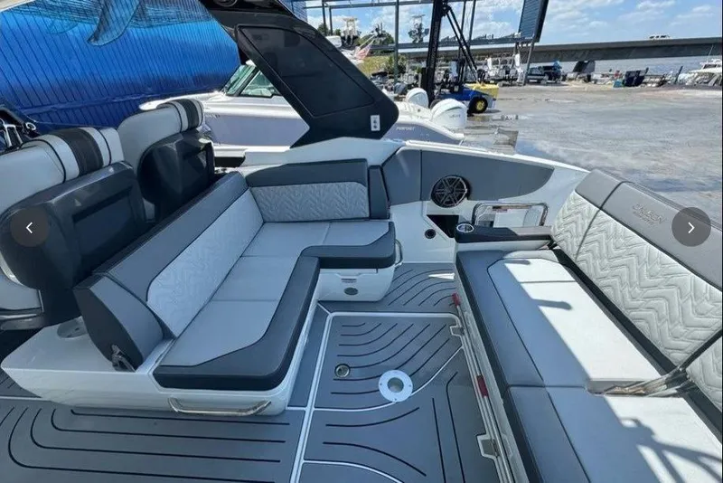 Slide: The Image of 2022 Galeon 325 GTO boat interior with luxurious seating and modern design. - 7