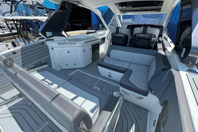 Slide: The Image of Luxurious interior of 2022 Galeon 325 GTO yacht with modern seating and sleek design. - 8