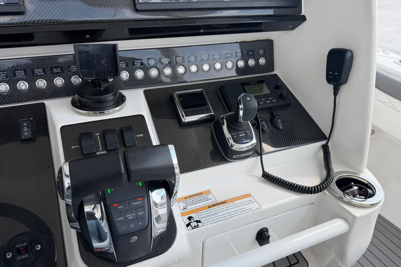 Slide: The Image of Control panel of a 2018 Fountain 39 NX boat with joystick and throttle controls. - 22