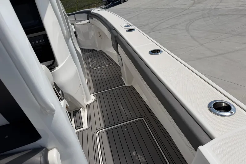 Slide: The Image of 2018 Fountain 39 NX boat interior with sleek deck and cup holders. - 24