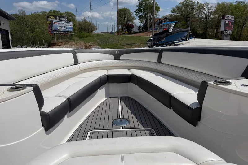 Slide: The Image of Interior view of 2018 Fountain 39 NX boat with luxurious seating and cup holders. - 27