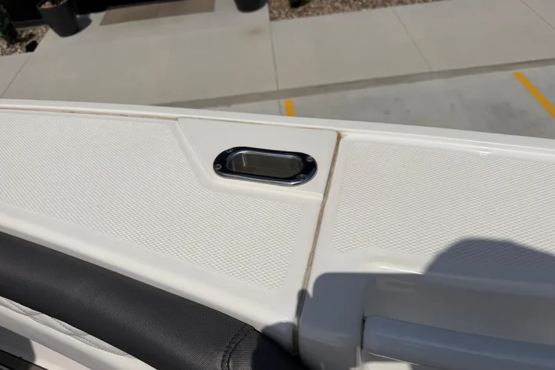 Slide: The Image of 2018 Fountain 39 NX boat deck detail with textured surface and recessed handle. - 28