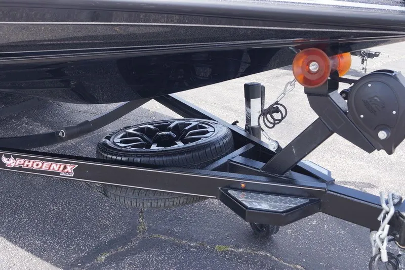 Slide: The Image of Trailer of 2026 Phoenix 921 Elite X boat with spare tire and winch. - 4