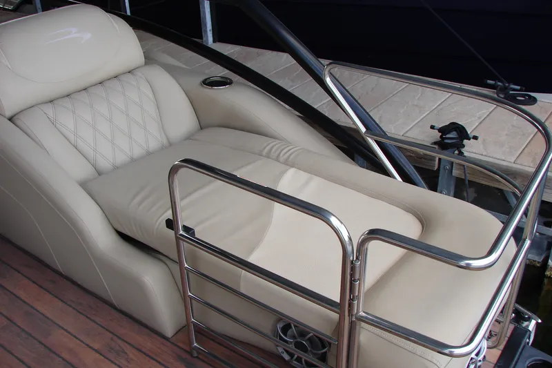 Slide: The Image of Luxurious seating on a 2015 Bennington 2875 QCW I/O boat with elegant design and comfort. - 25