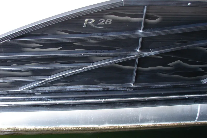 Slide: The Image of Close-up of 2015 Bennington 2875 QCW I/O boat hull with "R28" marking. - 6