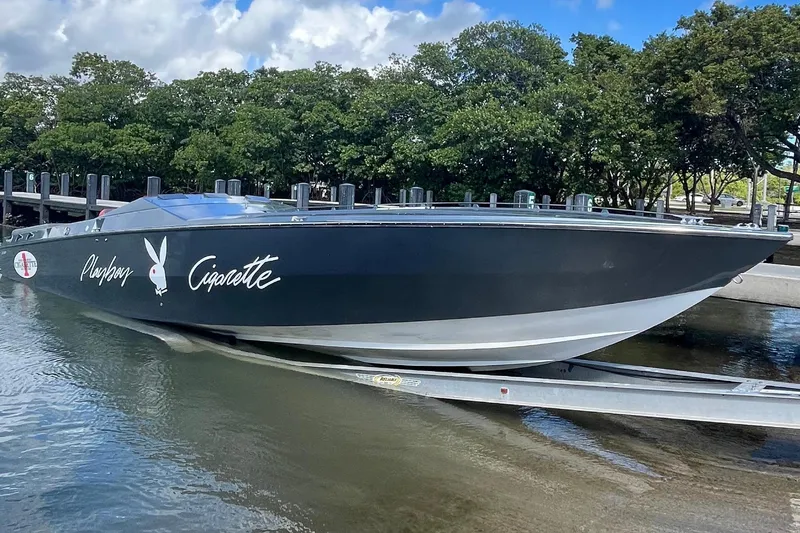 Slide: The Image of Cigarette 38' Top Gun GT 1994 - 2