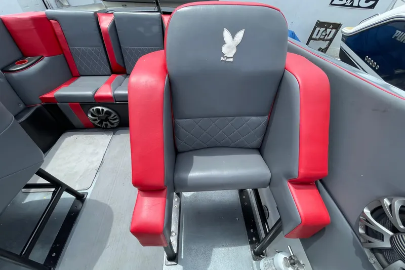 Slide: The Image of Red and gray seating on 1994 Cigarette 38' Top Gun GT boat interior. - 25