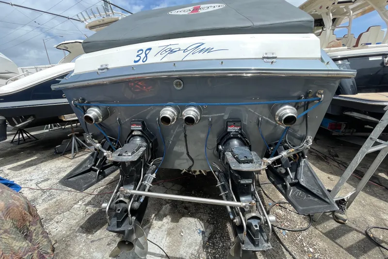 Slide: The Image of 1994 Cigarette 38' Top Gun GT boat with dual Mercury outboard engines. - 44