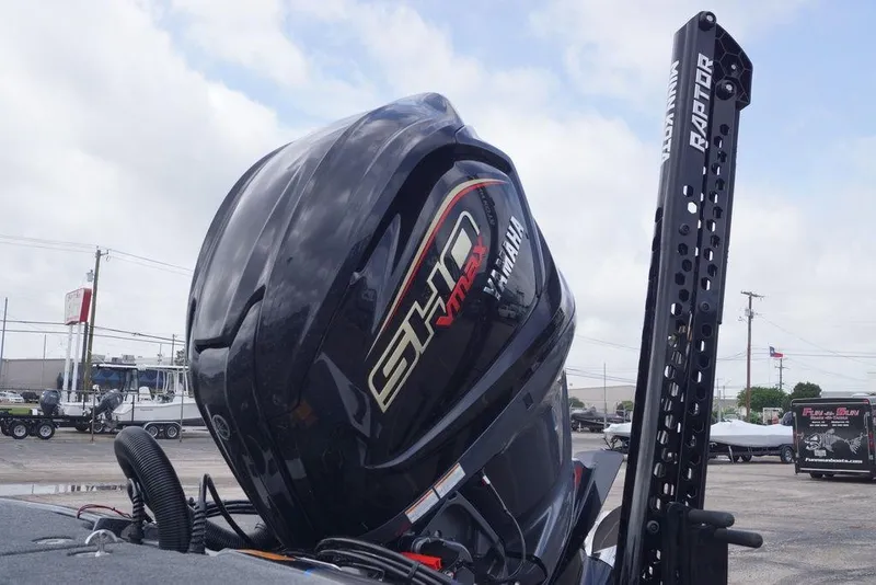 Slide: The Image of 2026 Skeeter FXR20 PRO with Yamaha SHO VMAX engine in a parking lot. - 11