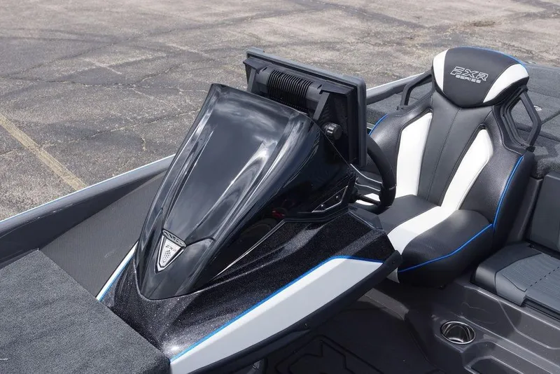 Slide: The Image of 2026 Skeeter FXR20 PRO boat interior with sleek black and white seating design. - 18