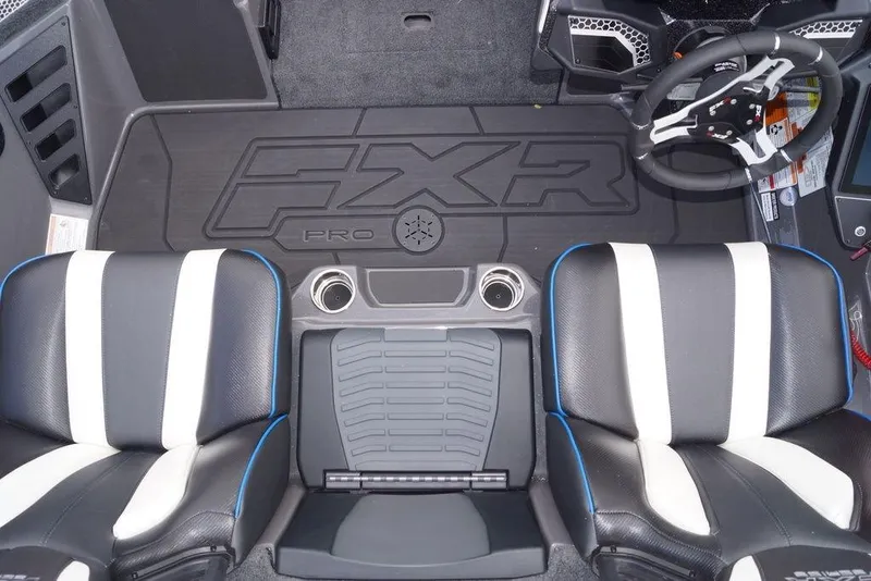 Slide: The Image of 2026 Skeeter FXR20 PRO boat interior with dual seats and steering wheel. - 21