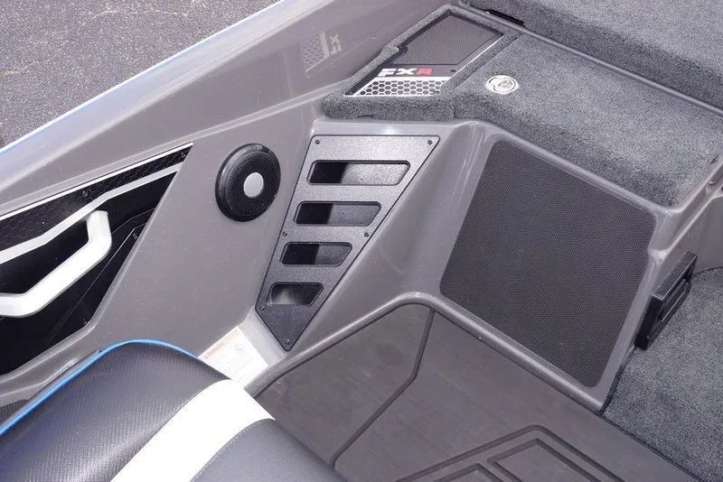 Slide: The Image of Interior view of 2026 Skeeter FXR20 PRO boat with speaker and storage compartments. - 24