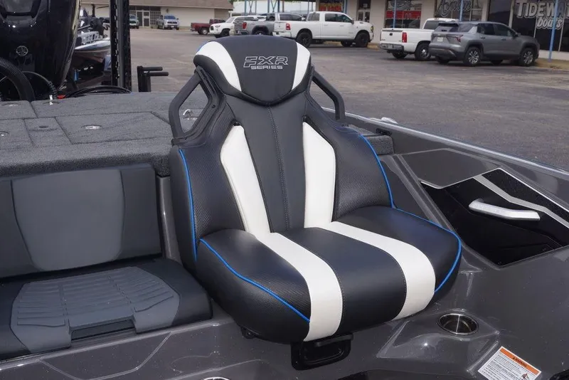 Slide: The Image of 2026 Skeeter FXR20 PRO boat seat, black and white design with blue accents. - 25