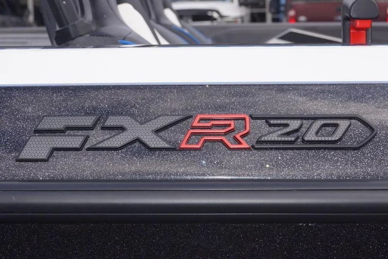 Slide: The Image of 2026 Skeeter FXR20 PRO logo on a sleek, metallic surface. - 6