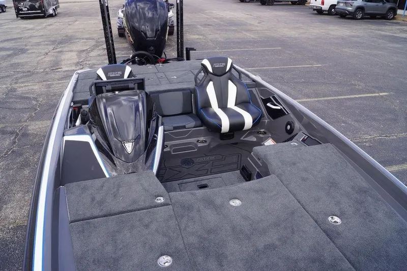 Slide: The Image of 2026 Skeeter FXR20 PRO boat interior with seating and storage compartments. - 9